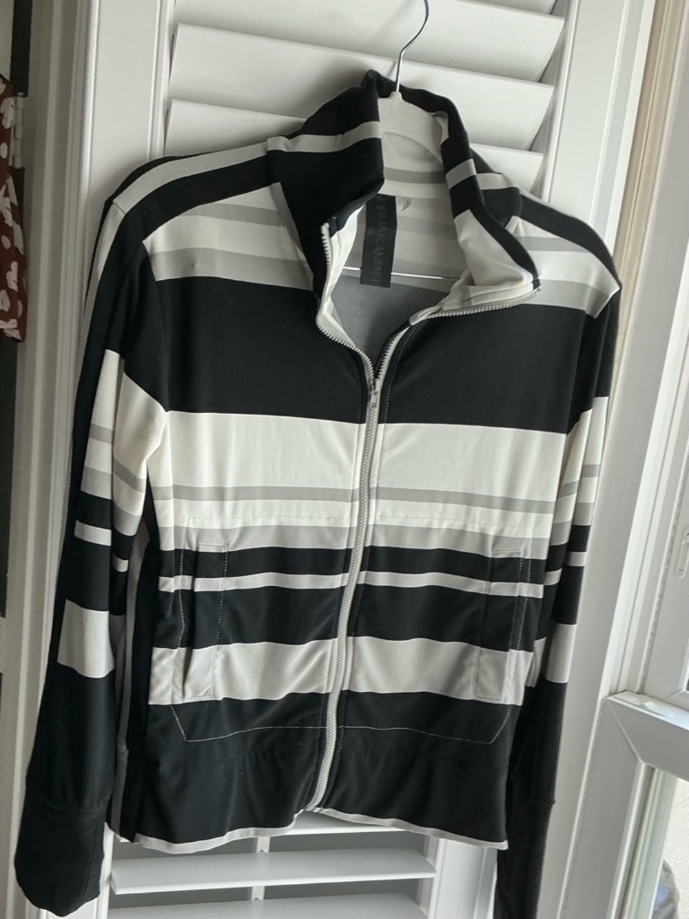 Norma Kamali black, white, and gray zip-up jacket. Size XS